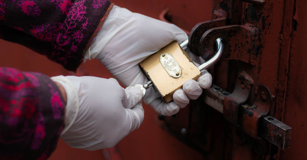 locksmith unlocking front door — Morris County Locksmith Corp
